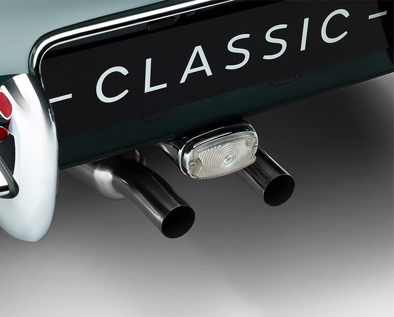 E-Type rear with twin polished exhausts and 'CLASSIC' number plate.